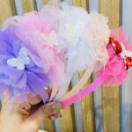 Balaca infantil mariposa en el centro-tul