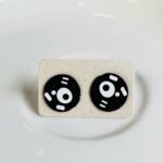Topos Oro Golfi - Círculo negro.