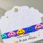Manilla mostacilla lila carita feliz