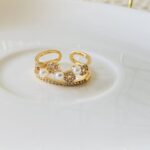 Anillo Arc flores perlado