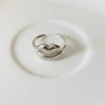 Anillo labios-plateados