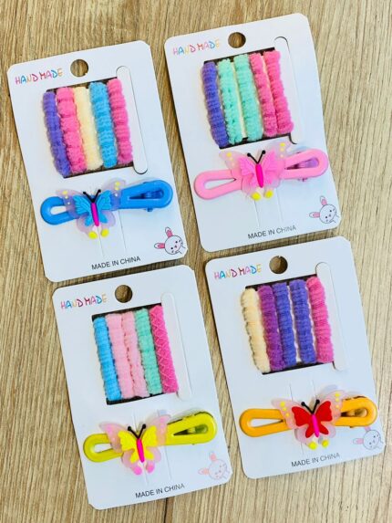 Set de pinza con moñas mariposas translúcida