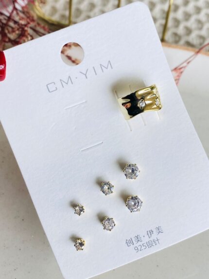 Set con Earcuff circones blancos