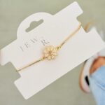 Pulsera margarita giratoria